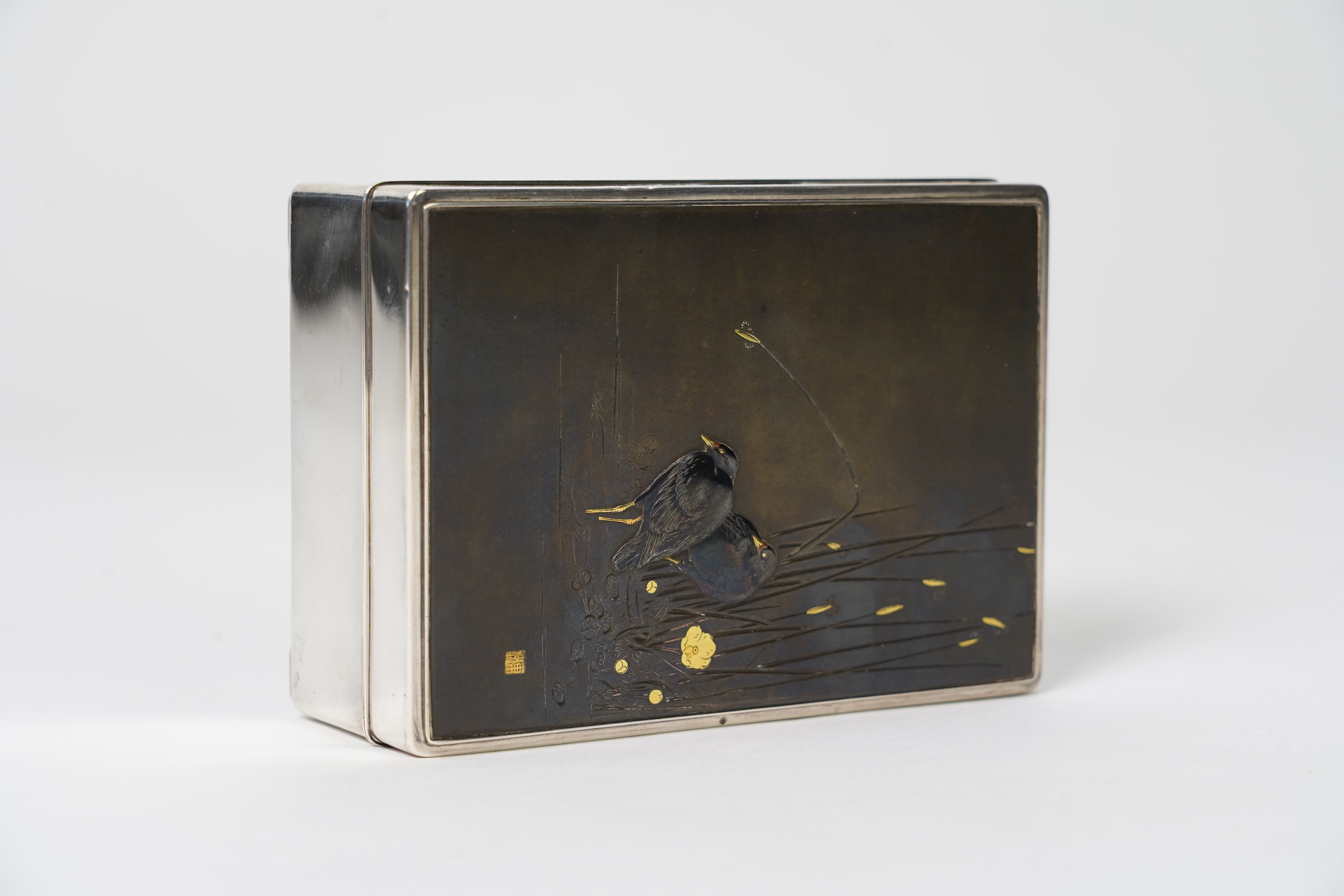 A Japanese shibuichi and shakudo mounted silver box and cover, Taisho period